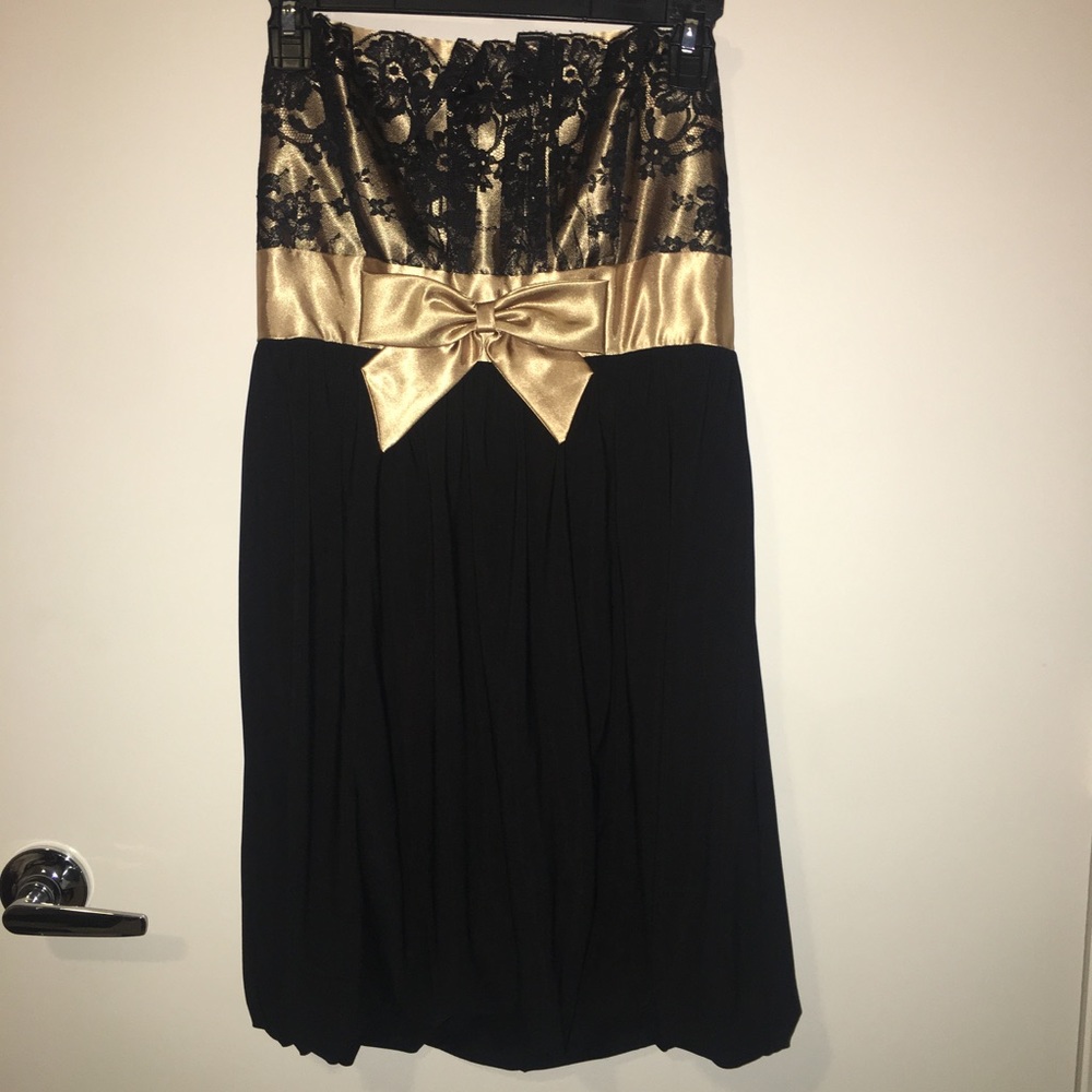 Black and gold dress with satin bow